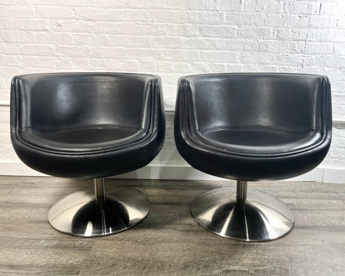 Pair Leather Swivel Chairs